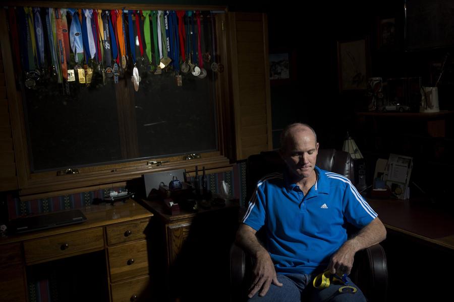 Runner Phil Kent, who attended the 2013 Boston Marathon but was stopped just short of completing it because of the bombing, in his Chatsworth, Calif., home on April 2, 2014. "I felt the pressure in my lungs, felt it in my ears. It stopped me in my tracks," he said. (Jay L. Clendenin/Los Angeles Times/MCT)