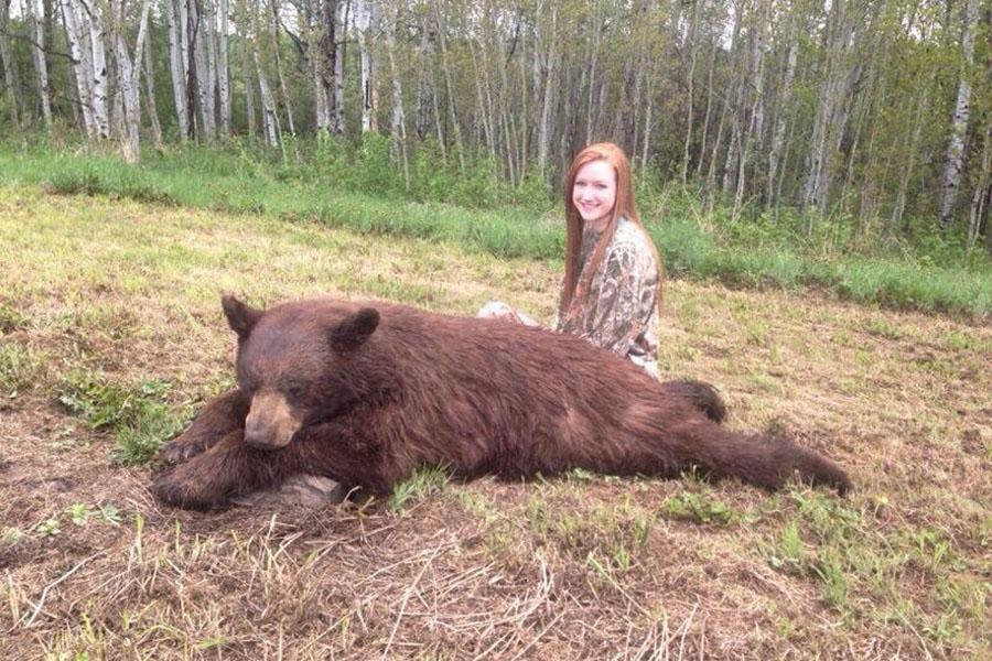 Junior Ally Brock poses with her kill.