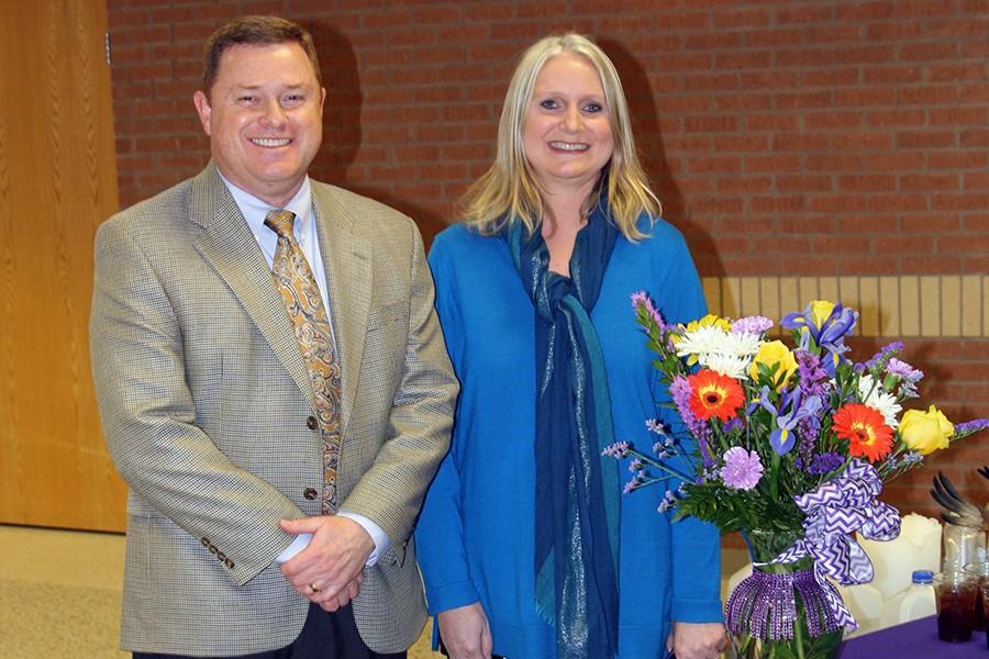 Jennifer Boren stands with Principal Tim Gilliland after being nominated the 2015 Canyon High School Teacher of the Year in February. 
