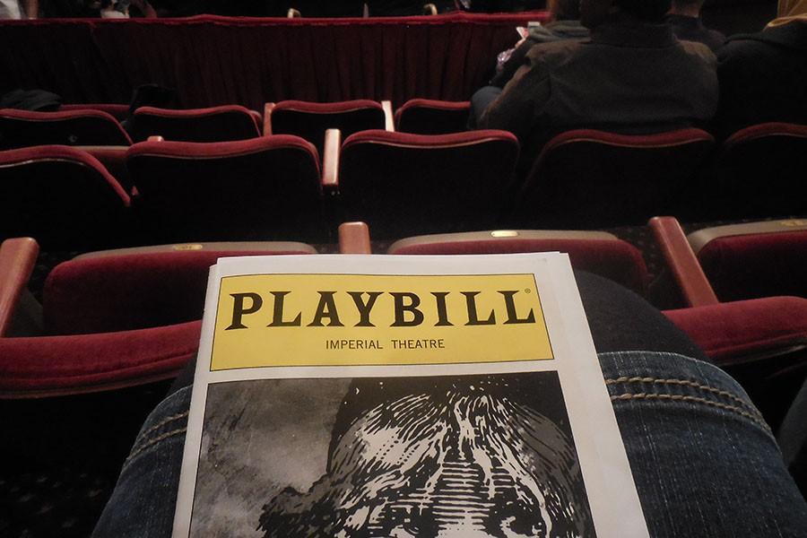 The playbill for Les Miserables sits in senior Tasha Browns lap.