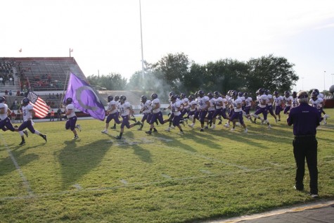 The Canyon Eagles run out of the tunnel to begin the opening game of their 2015 season against the Borger Bulldogs.