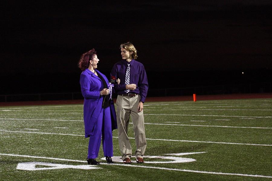 Treet Allison was escorted by his mother Sandy Allison at the Powder Puff game.