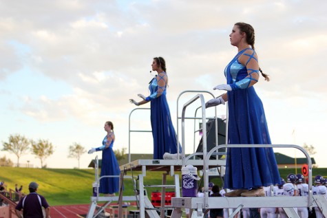  Drum Majors Maddy Edwards, Izzy Wheeler, and Berkley Trumbly conduct the band at the Tascosa game.