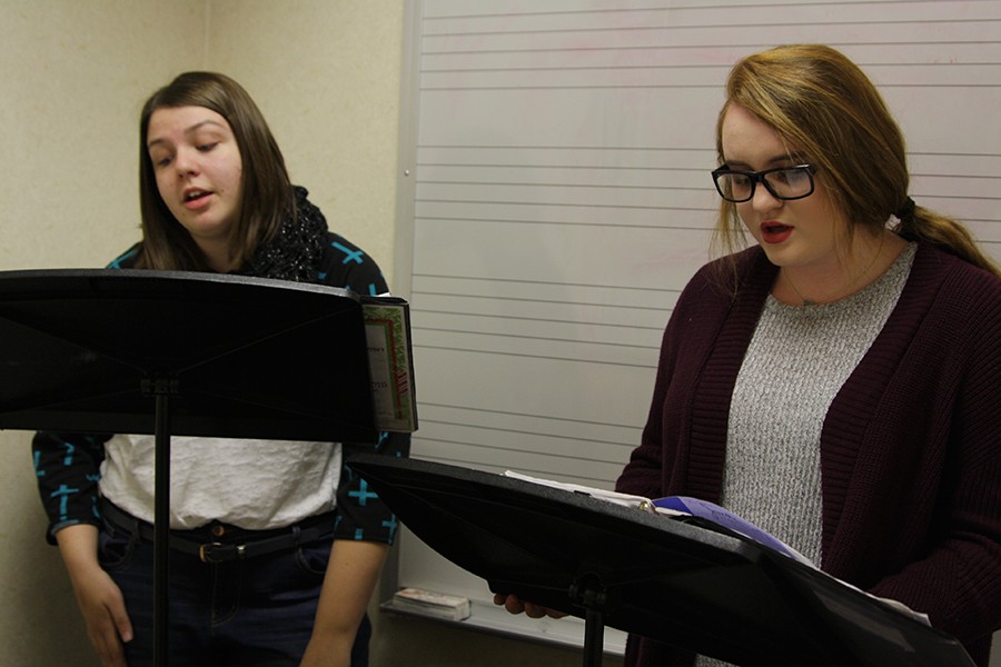 Junior Chayse Armstrong and sophomore Emily Tull practice their audition material during activity period.