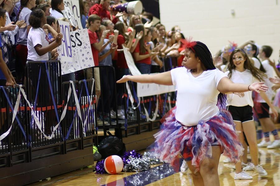 Junior Daisha Ferrell cheers the crowd at the Sept. 11 pep rally.