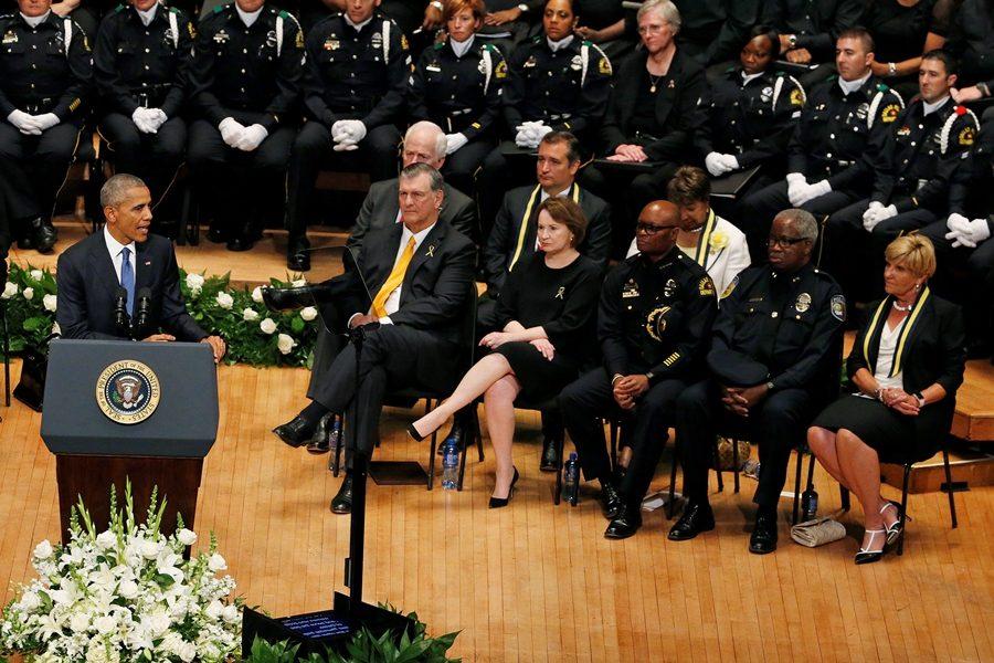 Dallas Mayor Mike Rawlings, his wife Micki, Dallas Police Chief David Brown, DART Police Chief J.D. Spiller and Fort Worth Mayor Betsy Price listen to President Barack Obama as he speaks during a memorial for five Dallas and DART police officers shot to death in last weeks attack on Tuesday, July 12, 2016, at the Morton H. Meyerson Symphony Center in Dallas. (Paul Moseley/Fort Worth Star Telegram/TNS)