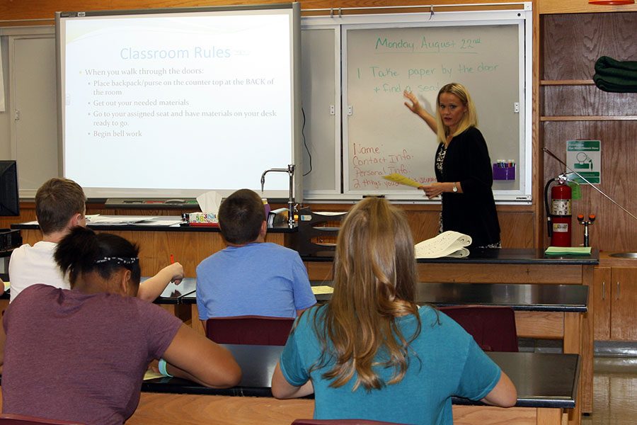 Biology teacher Kerri West explains classroom procedures to freshmen on the first day of school.