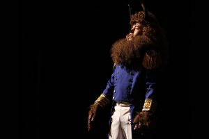 The Beast, played by junior Mitchell Hernandez, sings in the second act of the all-school musical Beauty and the Beast.