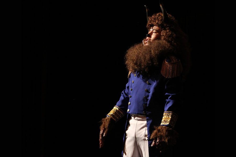 The Beast, played by junior Mitchell Hernandez, sings in the second act of the all-school musical Beauty and the Beast.