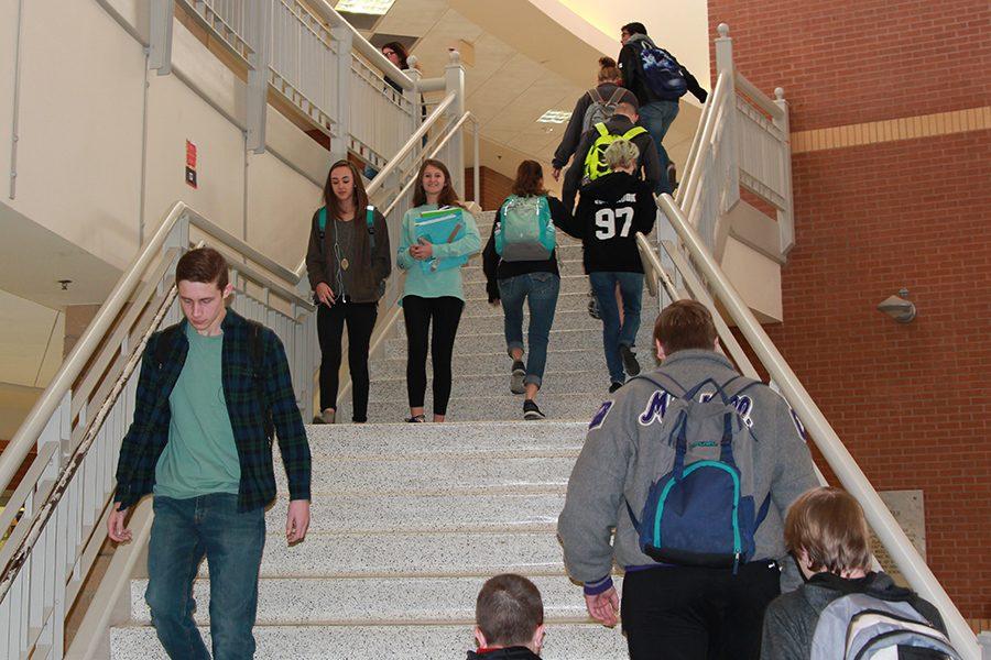 Students walk up and down the main stairwell during activity period Jan. 26.