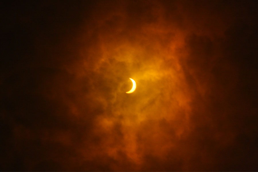 Coach Charles Johnson captured this image of the solar eclipse using a filter on his camera. The eclipse stretched from coast to coast Monday, Aug. 23. 