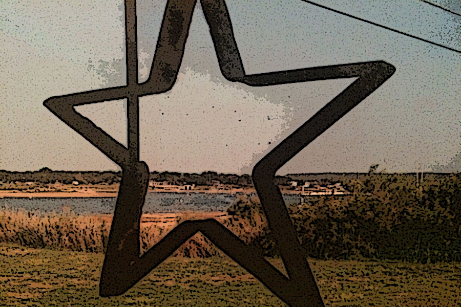 A+Texas+star+hangs+on+the+porch+over+looking+Possum+Kingdom+Lake.
