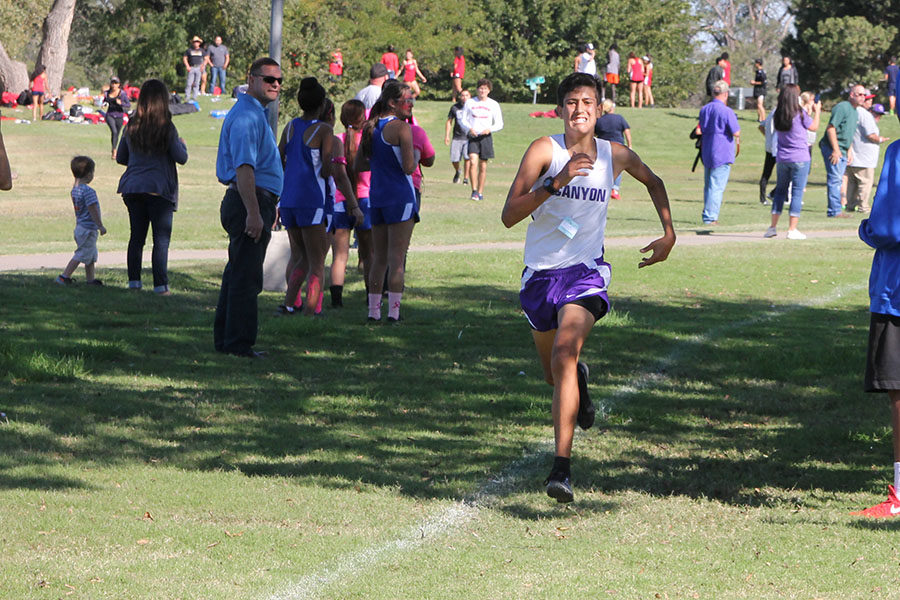 Freshman Samuel Ashley pushes toward his first place finish at the 3-5A District Cross Country Meet in Amarillo Oct. 13.
