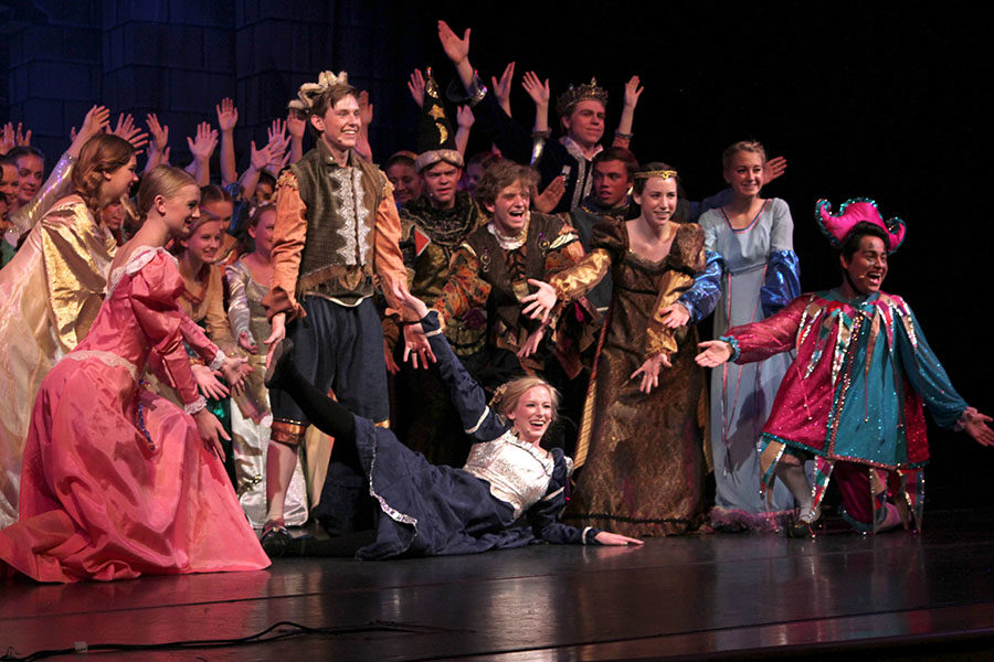 The cast holds for applause after finishing the first act.