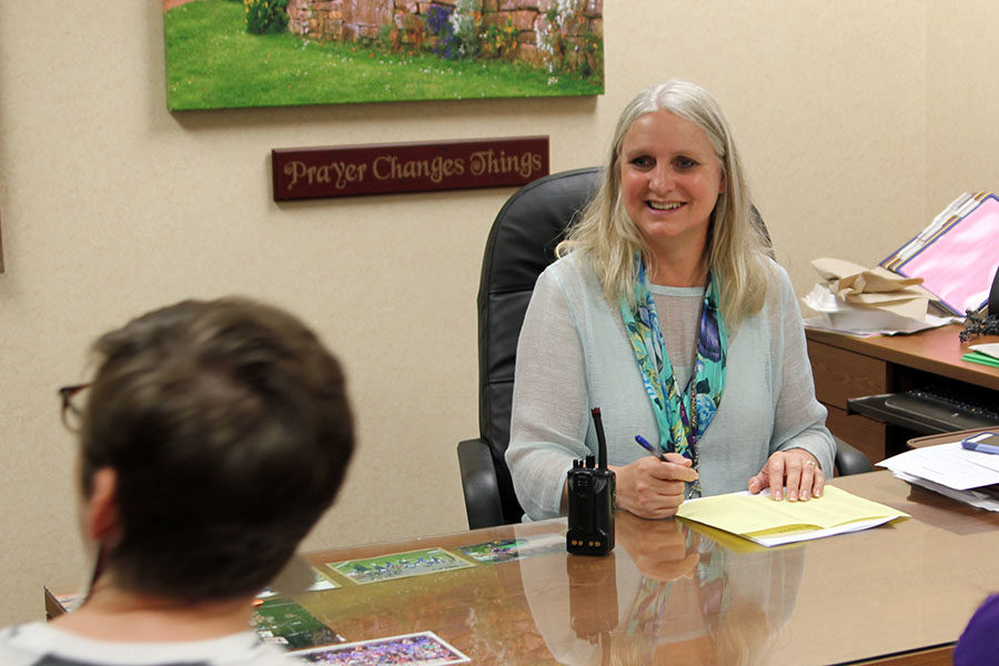 Associate Principal Jennifer Boren plans with 504 clerk Catherine Enns.