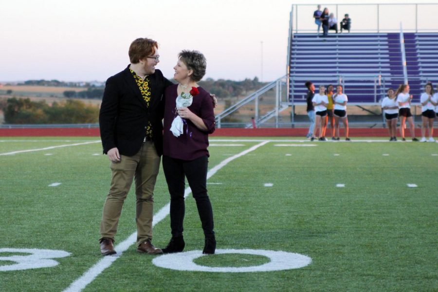 Homecoming king Seth Nease turns to his mother upon hearing his name announced as king.