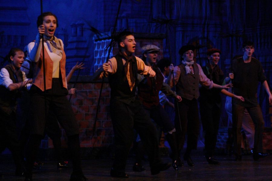 Chimney sweeps Erin Sheffield and Kelton Harbison tap dance during Step in Time. 
