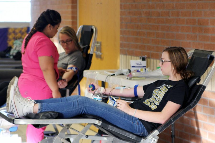Students donate during the fall Key Club Blood Drive in October 2017. 