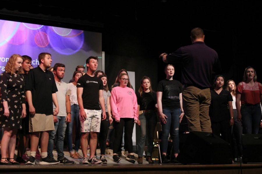 The varsity choir rehearses Monday afternoon for their annual variety show concert.