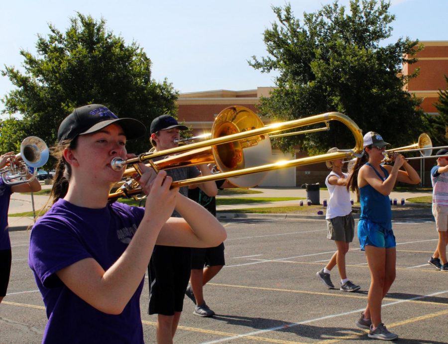 Sophomore Zoe Kizziar practices during summer band earlier this month.
