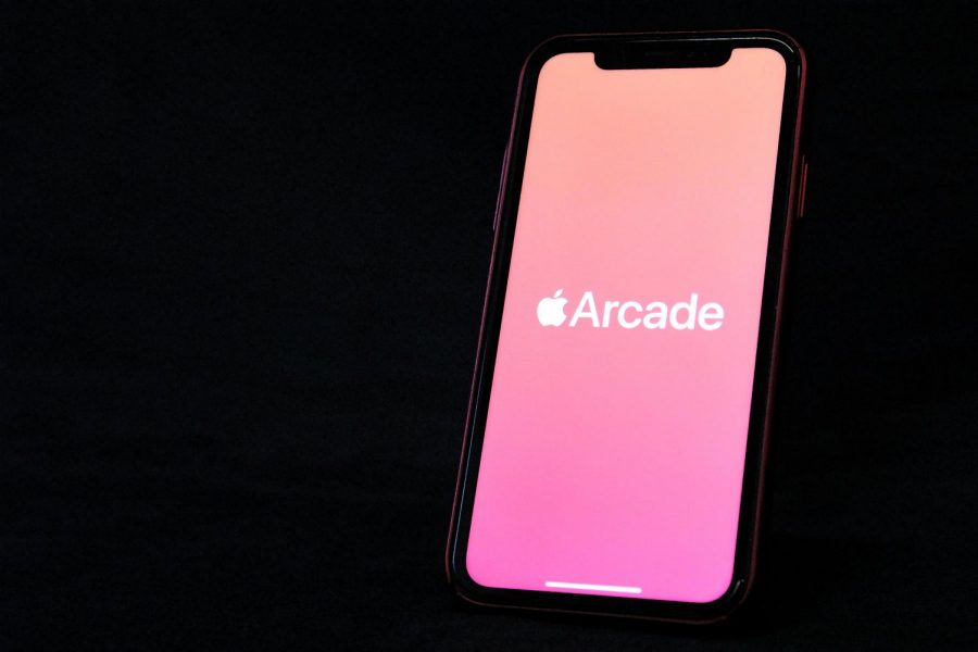 Apple Arcade is a monthly subscription service costing $4.99 with a one-month free trial for new users. 