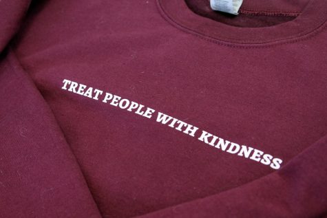 The slogan for Harry Styles upcoming tour is Treat people with kindness, a message that has been featured on several items of merchandise.