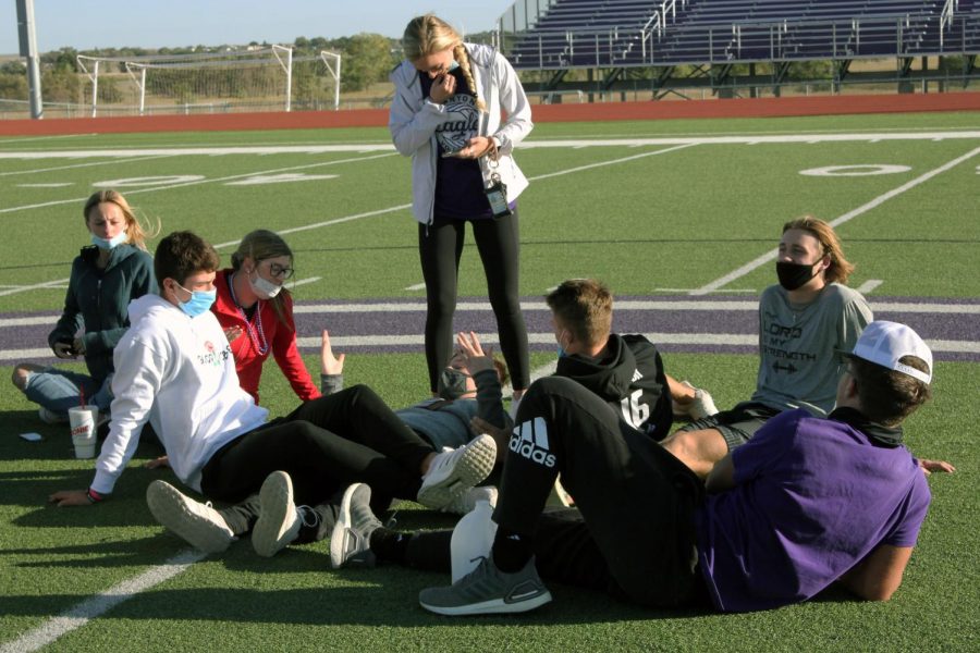 Members of the Fellowship of Christian Athletes meet in a small group to discuss strategies to follow Christ at their first meeting in September. FCA meets on the football field at 6 p.m. every Monday, and all Christian denominations are welcome.