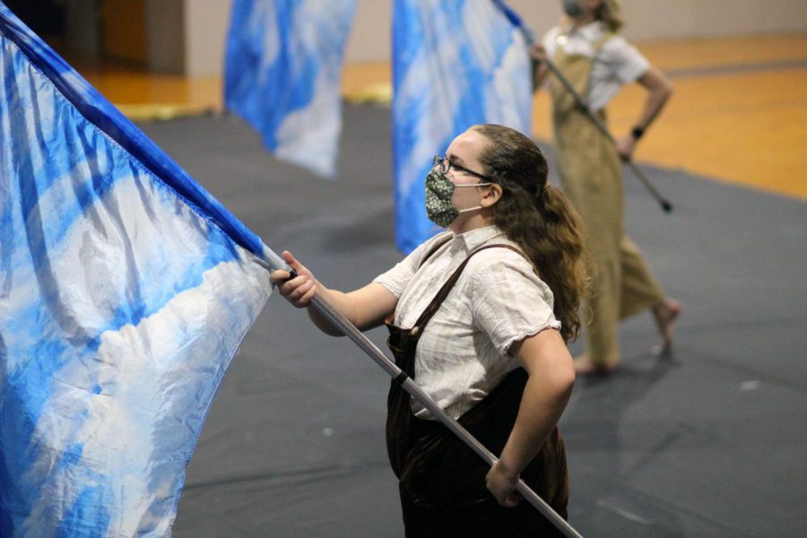 Varsity Winterguard  performed their show, Just Let Me Cry placing third at the Regional A contest March 30. Junior Johnson said the show demonstrates how people process the loss of loved ones.
Were just showing that loss really isnt something you need to be sad about, its more something that you need to celebrate. Which is why, at the end of our show, its more upbeat, rather than our slow previous tempo.

