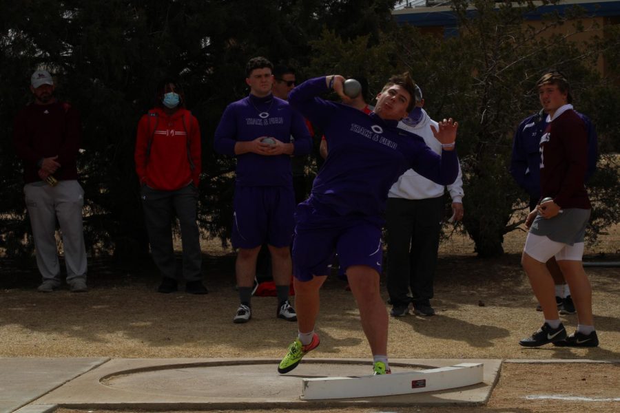 Senior Gabriel Cassles throws shot put. “ Most people think it is all about strength, but really it does not matter if you are big, tall or skinny, it is about perfecting your practice,” said Cassles. “I watch videos focusing on form and also have the coaches help me out. It is all about practice; every week I have improved.”