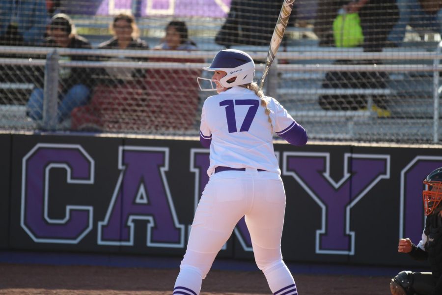 Senior Danielle Burns bats at Senior Night against Dumas. Burns, who is senior class valedictorian, throws shot put in addition to playing softball. Its about finding a balance, Burns said. The kinds of  classes I take are challenging, but thats what makes the high school experience. I know when I walk across the stage at graduation, I am going to be proud of everything I have done. 