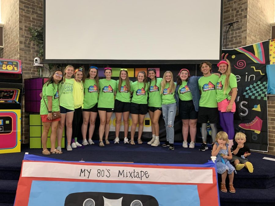 Junior Laci Lightfoot, four from the left, is accompanied by the girls youth group at their church VBS program.