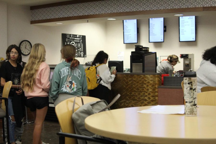 Students in line to order from the Caribou Coffee Café during lunch. “Everyone can find something they like,” sophomore Tylar Estep said. The Cafe is open to students before school and during both lunches.