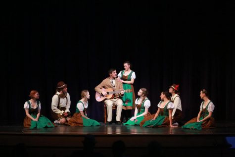 Captain von Trapp, played by sophomore Trace Thomas, plays the guitar as he sings Edelweiss to his family. The show for me is an experiment to see what all I can do [as an actor], Thomas said. Canyon High will perform The Sound of Music Nov. 17-20, tickets can be purchased on TicketSpicket.