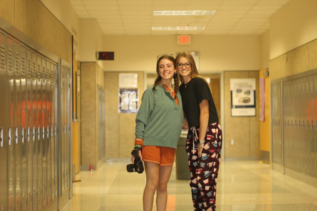 Seniors Aubrey Lenerose and Brylee Edwards wear PJs for the #WokeUpLikeThis dress up day. Edwards said she participated to have an excuse to wear PJ pants in public. The inspiration for my outfit was really just the fact that I absolutely love those PJ pants, Edwards said. They are my favorite to lounge in.
