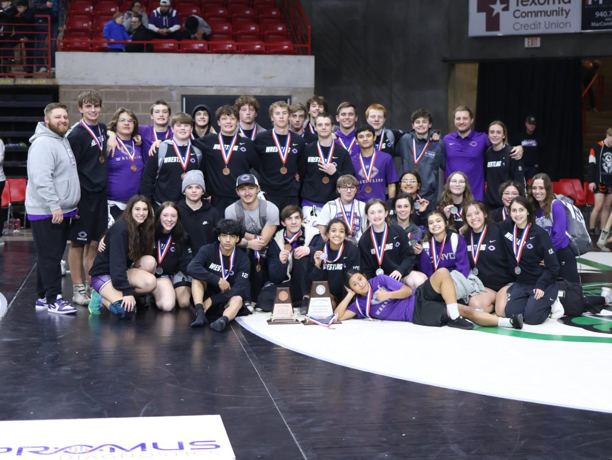 For+the+first+time+in+school+history+boys+and+girls+wrestling+competed+in+the+Texas+High+School+Wrestling+Coaches+Association%E2%80%99s+State+Duals+on+Jan.+20+in+Wichita+Falls.+The+girls+team+claimed+second+and+the+boys+team+took+third.