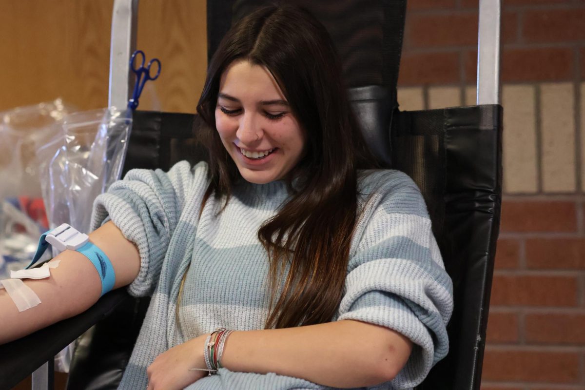 Sophomore+Makalyn+Lee+donates+blood+at+the+Winter+2024+Blood+Drive.+%E2%80%9CDonated+blood+assists+in+a+lot+of+medical+procedures+like+surgery+or+after+traumatic+accidents%2C%E2%80%9D+Key+Club+co-sponsor+Lance+Culbert+said.+%E2%80%9COne+of+the+things+that+I+did+not+realize+until+recently+is+that+blood+and+platelets+are+given+to+a+lot+of+cancer+patients+that+are+undergoing+chemotherapy+because+their+blood+counts+go+down+because+of+the+chemotherapy.%E2%80%9D