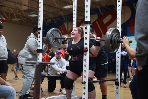 Senior Madigan Lee competes at the Plainview Powerlifting tournament.