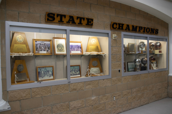 The gym state championship trophies from the previous years.