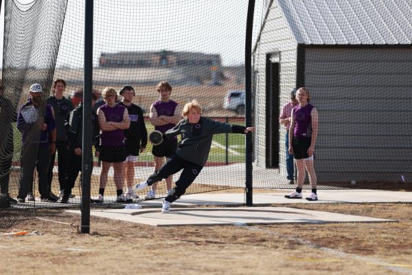 Kelton Burgoon getting ready to throw discus at Randall track triangular. “When you’re in discus [track] it comes down to how much work and time you put into it,” sophomore Burgoon said.