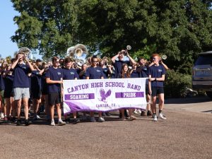 Junior, Deegan Scarborough, marches with the band at the homecoming parade. “It was a really long parade, it was really hot, but I had a lot of fun playing with the band and marching and supporting the school,” Scarborough said. “My homecoming was pretty fun. I brought my first date to the homecoming game and it was really fun.”