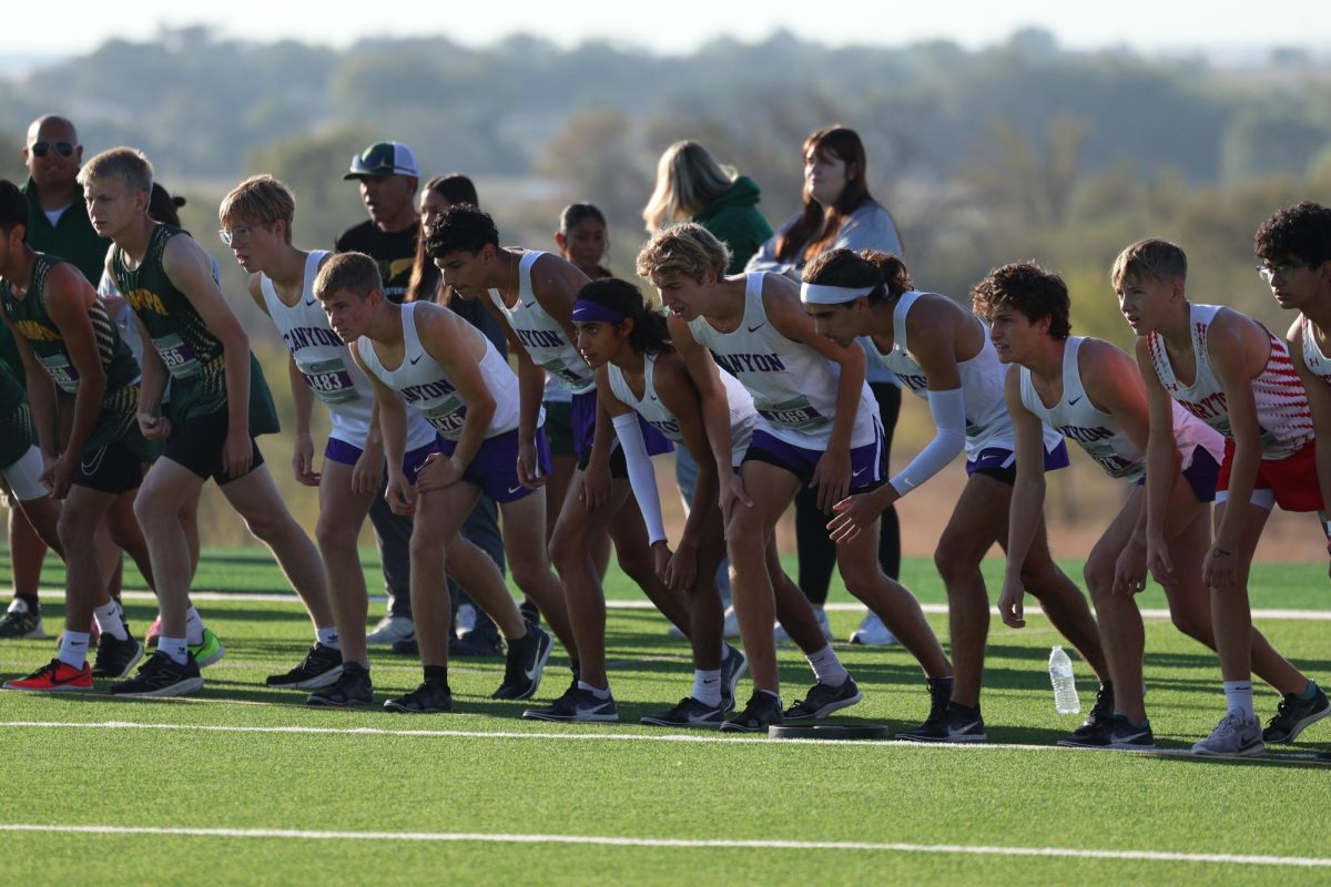 Boys Cross Country takes off for a district win. 