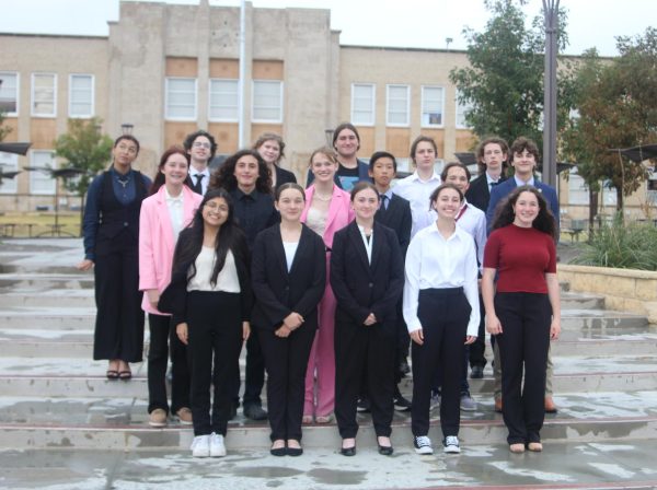 2024 Debate team posing in front of Borger High School at their first tournament of the year.