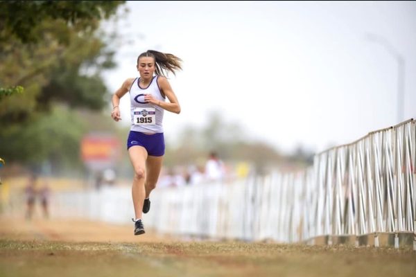 Junior Addy Bristow running at the State Meet. “It's such a great feeling to work hard towards something," Bristow said. "You get a feeling of accomplishment afterwards, and you get to push yourself to new goals all the time.”  