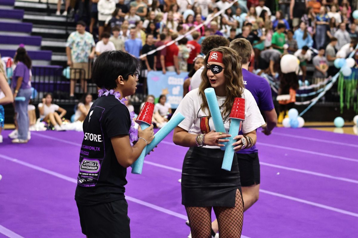 Seniors Sam Potestas and Jacie Hamilton represent their class during the pep rally game.