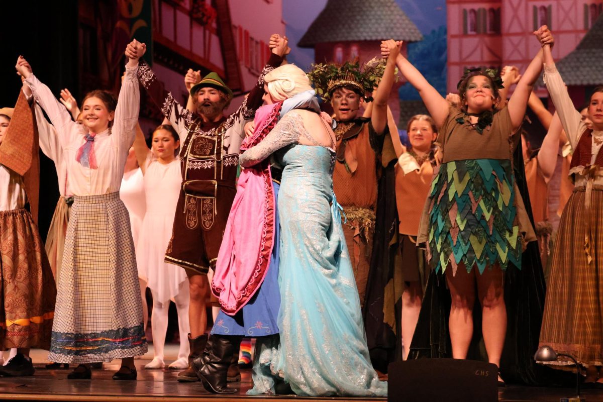 Elsa (Gordon) and Anna (Talley) embrace after unfreezing Arendelle. They learn that true love comes in many forms.