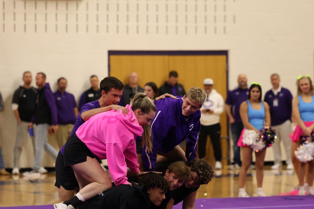 Junior class officers competing for the tie breaker.
