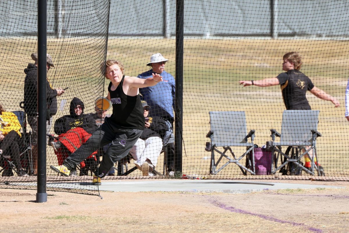 Senior Kelton Burgoon competes in discus at the Canyon Invitational on March 6 at Canyon High School. His throw of 201 feet, 8 inches shattered the previous school record and placed him first nationally this season.